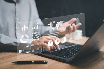 Smart digital marketing data management concept, Businessman use the laptop to work on marketing analysis chart strategic planning data management for sustainable development