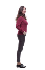 side view. casual young woman looking at a white screen