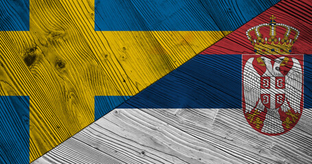 Background with flag of Sweden and Serbia on wooden split board. 3d illustration