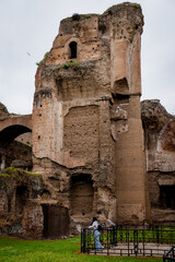 tourist visiting the baths of caracalla in rome-italy