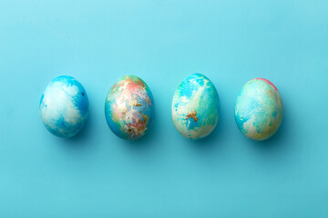 Easter eggs viewed from above. Colorful Easter background. Top view