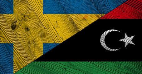 Background with flag of Sweden and Libya on wooden split board. 3d illustration