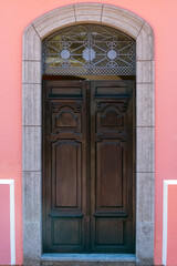 Old wooden door in a wall