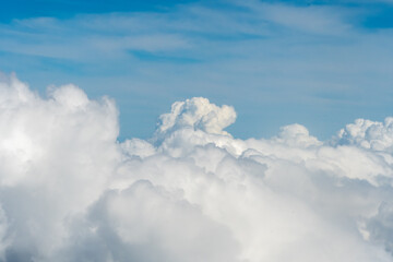 White clouds and blue sky in this aerial photograph of clouds