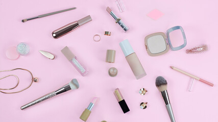 Flat lay beauty and fashion with lip sticks, powder lip gloss on pink background Essential beauty items Beauty Cosmetics Fashion