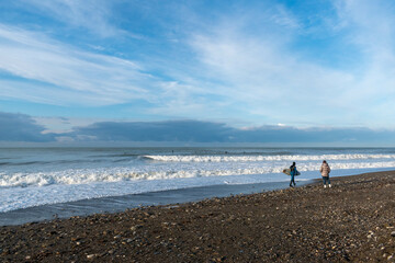 person walking on the beach