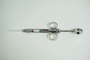 carpulse syringe special instruments that are used in dentistry for local anesthesia. They can be made of metal, glass or plastic and have a simple design of a cylindrical body and piston