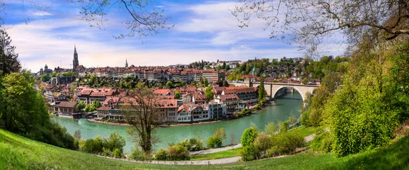 Fototapeten Switzerland. Swiss travel and landmarks .Romantic bridges and canals of Bern capital city panoramic view of old town © Freesurf
