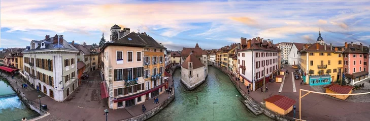 Poster France travel and landmarks. Romantic beautiful old town of Annecy aerial drone view with medieval castle. Haute-Savoi region. © Freesurf