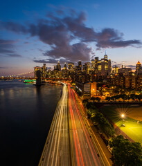 Fototapeta premium Famous views over New York taken from the Manhattan Bridge during Blue Hour