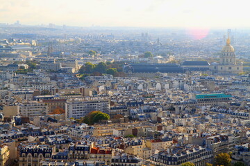 Fototapeta na wymiar Parisien architecture and french roofs from above Eiffel tower at sunrise, Paris, France
