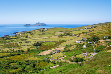 Fototapeta na wymiar Landscape of beach, hills and atlantic ocean of beautiful Ring of Kerry, Ireland. Travel destination for many tourists