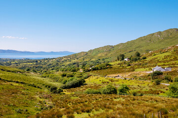 Landscape of beach, hills and atlantic ocean of beautiful Ring of Kerry, Ireland. Travel destination for many tourists