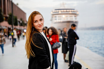 Woman travel in Istanbul near Hagia Sophia famous islamic Landmark mosque, Travel to Istanbul, Turkey background.
