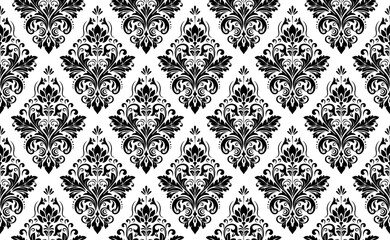 Wallpaper in the style of Baroque. Seamless vector background. White and black floral ornament. Graphic pattern for fabric, wallpaper, packaging. Ornate Damask flower ornament