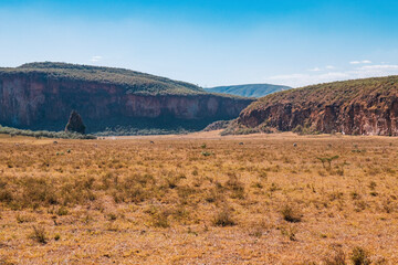 Scenic view of volcanic rock formations at Hell's Gate, Naivasha, Rift Valley, Kenya