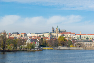 Fototapeta na wymiar the city of Prague on the banks of the blue river