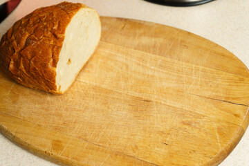 Bread on wooden cutting board