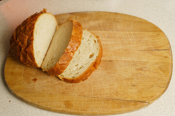 Slices of Bread on wooden cutting board
