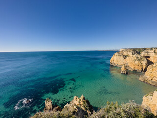 Beautiful sandy beach near Lagos in Ponta da Piedade, Algarve region, Portugal.