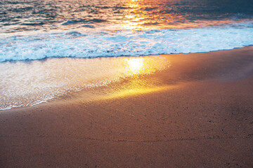 Beautiful bright sunset on the background of the Mediterranean beach. Natural background, tourism travel holidays.