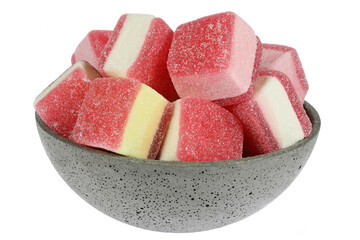 German candy called ‘Hamburger Speck’ in a concrete bowl isolated on white background