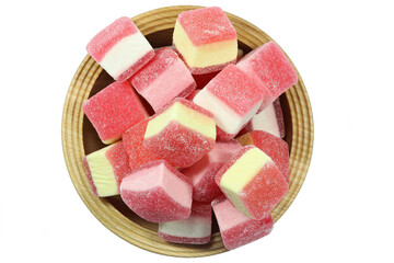 German candy called ‘Hamburger Speck’ in a wooden bowl isolated on white background