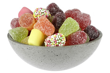 Dutch tum tum candies in a concrete bowl isolated on white background