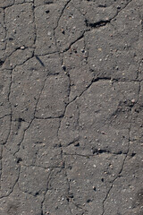 Cracks in the asphalt. Old road.