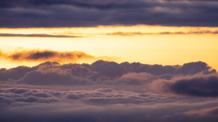 Aerial Cloudscape during morning Sunrise Sky. British Columbia, Canada. Nature Background
