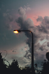 Pink Sunset with Street Lantern and Clouds