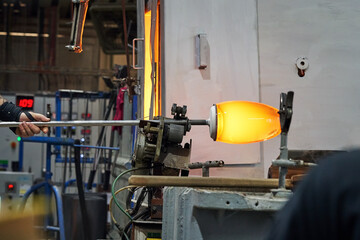 Blowing glass at glassworks