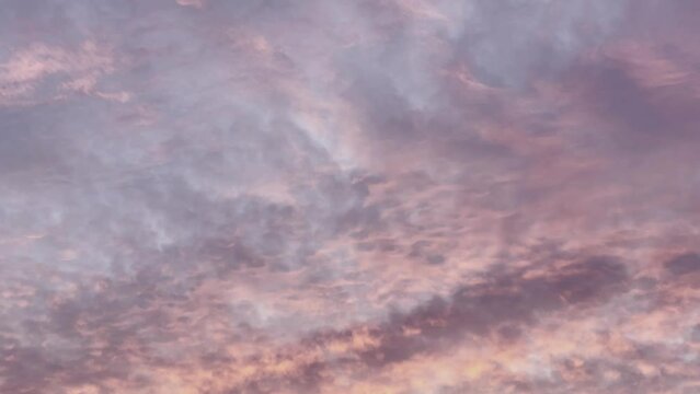 Pastel pink and purple clouds at sunset