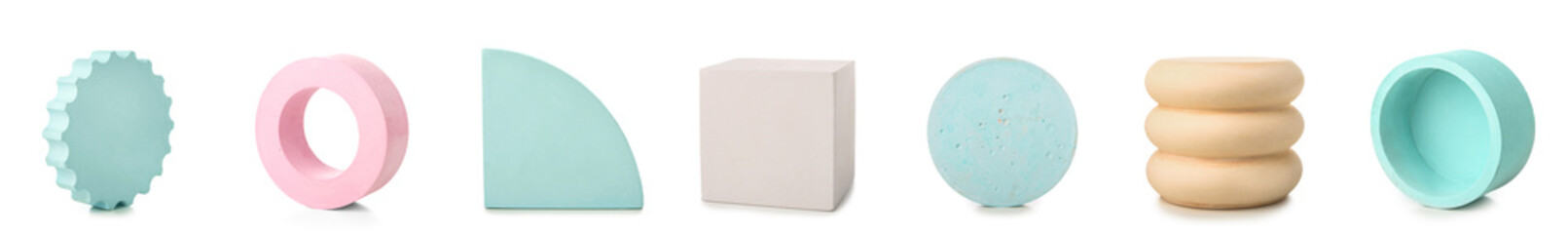 Set of empty podiums on white background