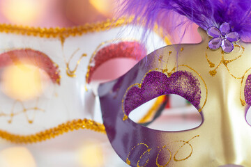Festive face mask for carnival celebration. Mardi Gras carnival background with carnival mask. Carnival. bokeh.