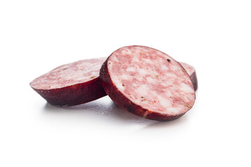 Sliced smoked pork sausage isolated on white background.