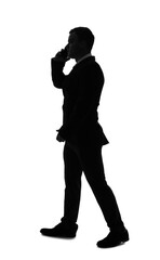 Silhouette of businessman talking by mobile phone on white background