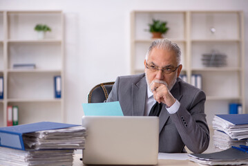 Old male employee and too much work in the office