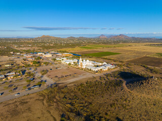 Obraz premium Mission San Xavier del Bac aerial view in Tohono O'odham Nation Indian Reservation near city of Tucson, Arizona AZ, USA. 
