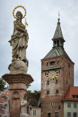 Landsberg am Lech, famous medieval village over the bavarian romantic road. Detail of the main square tower and Marienbrunnen (fountain of the Virgin Mary)