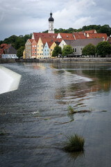 Landsberg am Lech, famous medieval village over the bavarian romantic road. Detail of the river shore with colorful houses
