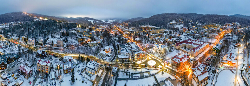 Aerial view of Krynica Zdroj City and Beskid Sadecki Mountains from a drone