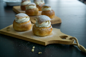 Swedish Semla. A traditional scandinavian cream filled cardamom bun with almond paste.