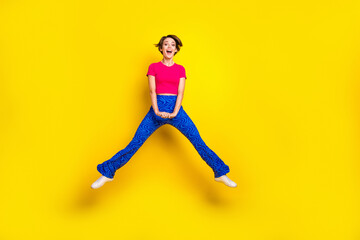 Fototapeta na wymiar Full length photo of positive optimistic lady wear pink comfort clothes have fun cool party empty space isolated on yellow color background