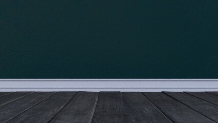 TEal wall with white molding and wooden floor.