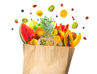 Explosion of Healthy food in the recycle ecological paper bag. Studio shot of different types of...