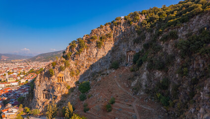 Fototapeta na wymiar Lycian ancient old Tombs around Fethiye Turkey, arial top view
