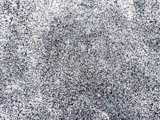 Large grainy vector grunge texture, white snow on black ice. Unique natural abstract background. For overlays, stencils, underlays, stylizations, designs and polygraphs. Distress design template