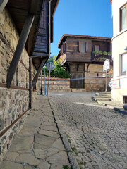 Fototapeta na wymiar Typical street and houses at old town of Sozopol, Bulgaria