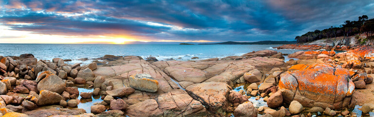 Panoramic view of colorful granite rocks on coastline of Coles Bay, Freycinet Peninsula, Tasmania, Australia